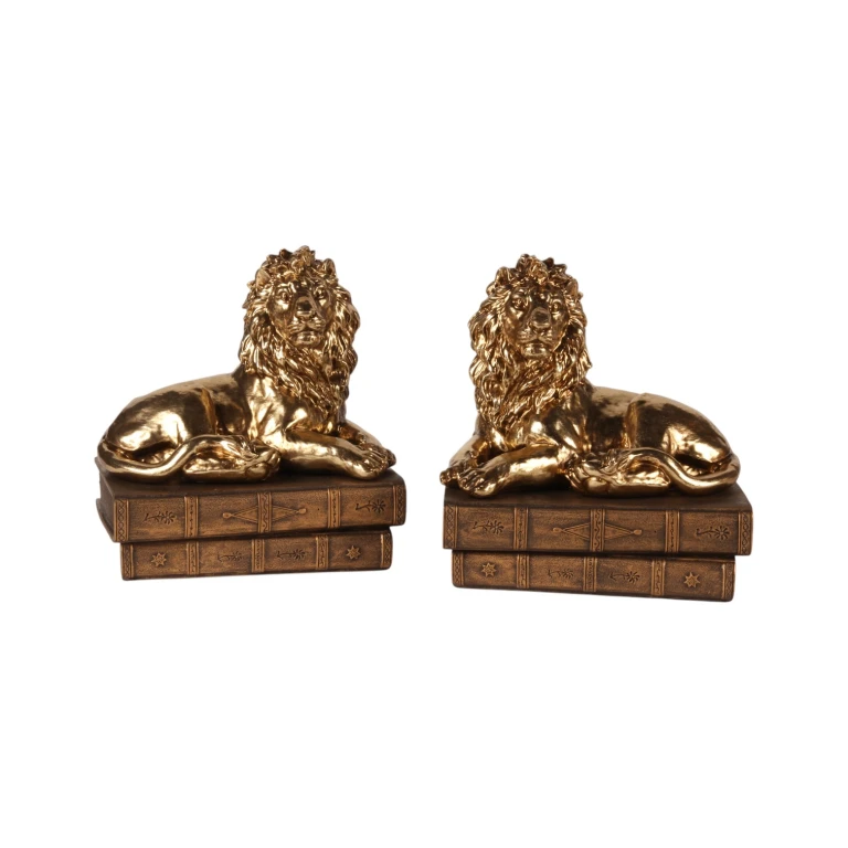Escultura de leão sobre livros - dourado - 21 cm
